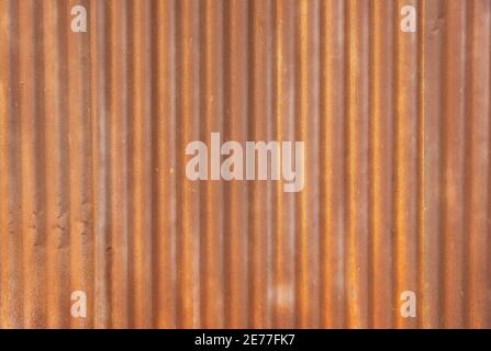 Rusted zinc roof wall for background. Stock Photo