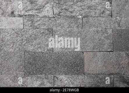 Closeup of the Black Marble Tiled wall in the background Stock Photo