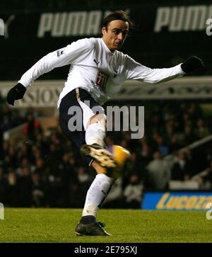 Tottenham Hotspur's Dimitar Berbatov shoots and scores against Newcastle United during their English Premier League soccer match at White Hart Lane in London January 14, 2007.     NO ONLINE/INTERNET USAGE WITHOUT A LICENCE FROM THE FOOTBALL DATA CO LTD. FOR LICENCE ENQUIRIES PLEASE TELEPHONE +44 (0) 207 864 9000.    REUTERS/Dylan Martinez  (BRITAIN)