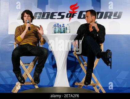 Actors Jon Heder (L) and Will Arnett talk during a media opportunity at an ice skating rink to promote their film 'Blades of Glory' in Sydney June 6, 2007.         REUTERS/Tim Wimborne     (AUSTRALIA)