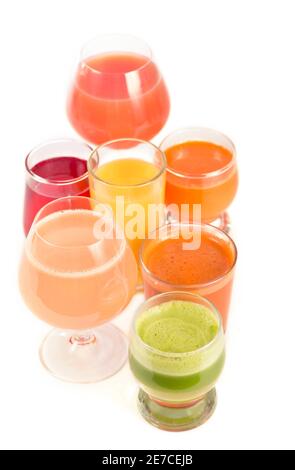 Glasses with fresh organic vegetable and fruit juices isolated on white. Detox diet Stock Photo