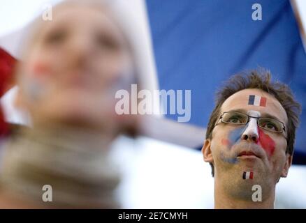 A France soccer fan watches his team at a fan festival in Frankfurt during the second round World Cup 2006 soccer match between [Spain] and France June 27, 2006.