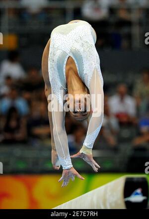 Francesca Benolli of Italy competes in the women's qualification balance beam during the artistic gymnastics competition at the Beijing 2008 Olympic Games August 10, 2008.  REUTERS/Dylan Martinez (CHINA)