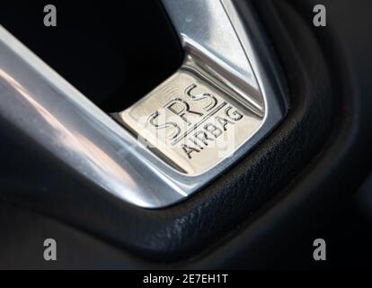 SRS Airbag sign on a dashboard of a car, close up. Stock Photo