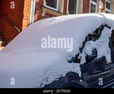 Car completely covered with snow Stock Photo