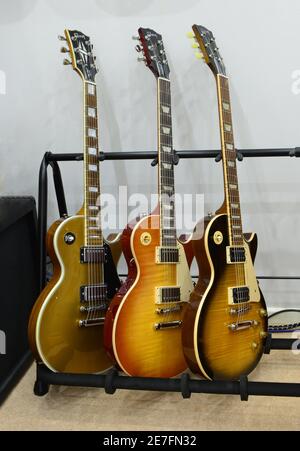 Gibson Les Paul guitars in a rack. Stock Photo