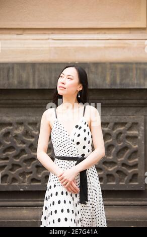 Photo shoot with a young Asian lady at Old Treasury Building in Melbourne CBD Stock Photo