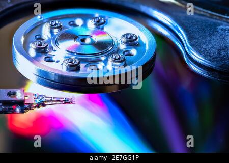 Macro of an open computer hard drive with the read/write head Stock Photo