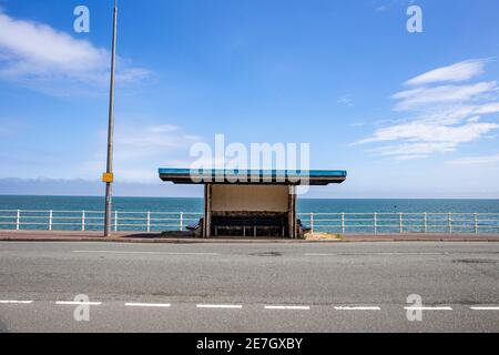 Seaside shelter on the promenade in Colwyn Bay, Wales UK Stock Photo