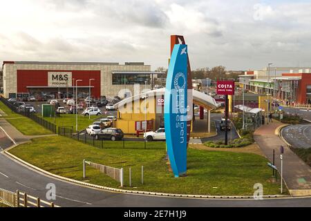 Aerial view of the entrance to Rushden Lakes Shopping Centre, Northamptonshire, England, UK Stock Photo