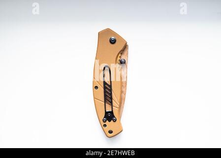 folding hunting knife on a white background Stock Photo