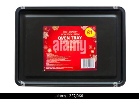 high quality non stick oven tray, baking tray with label with information isolated on white background - dishwasher & freezer safe Stock Photo