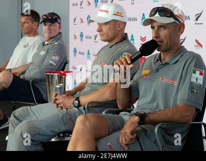 Auckland, New Zealand, 30 January, 2021 -  Italian team Luna Rossa Prada Pirelli's jointly  helmed by Jimmy Spithill and Francesco Bruni (right) speak at the after race press conference after winning the Prada Cup semi-finals by beating New York Yacht Club American Magic team on Patriot, skippered by Terry Hutchinson (2nd left) and helmed by Dean Barker (left) . The Italian team won the semi-final 4-0 and will meet INEOS Team UK in the Prada Cup final starting February 12. Behind is Auckland's Sky Tower. Credit: Rob Taggart/Alamy Live News Stock Photo