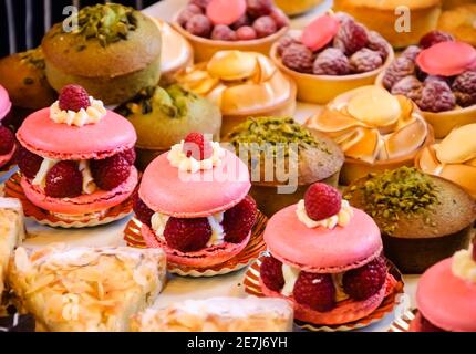 French pastries on display on a confectionery stall at the famous Borough Market (London, England). Stock Photo