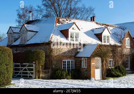 Traditional brick and flint cottage in a village in the Chilterns, Oxfordshire, England, UK Stock Photo