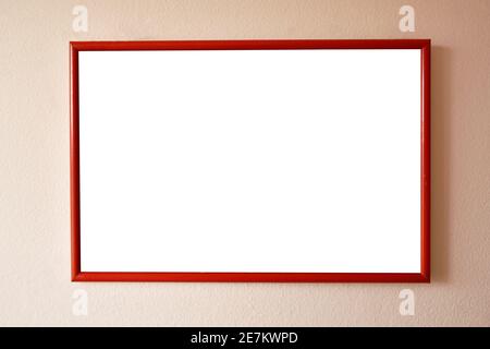 wooden picture frame hanging on old cement wall Stock Photo
