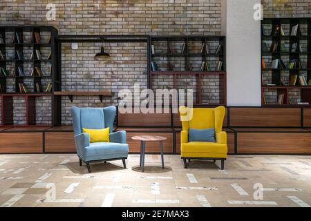 Blank poster in loft private office with book case. High quality photo Stock Photo