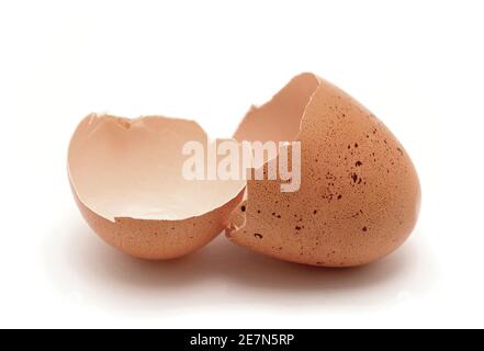 Opened cracked egg shell on white background. Stock Photo