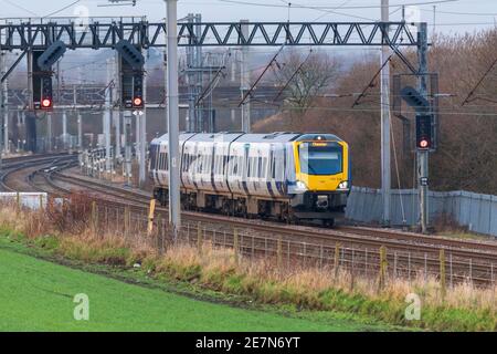 A  Northern Rail Class 195 diesel train at Winwick junction on the West Coast Main Line. WCML Stock Photo