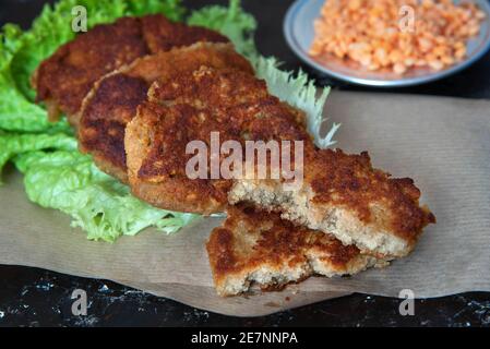 Vegan homemade burgers from lentils. Vegetarian lentil cutlets. Stock Photo