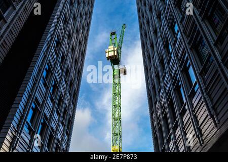 Construction crane and Central Saint Giles skyscrapers, office buildings in St Giles, London, UK Stock Photo