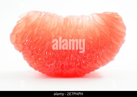 juicy red grapefruit slice on a white background Stock Photo