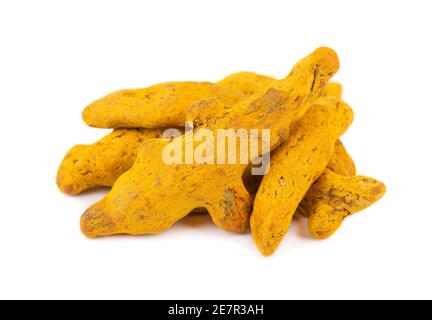 Dry turmeric root isolated on white background. Curcuma longa linn. Stock Photo