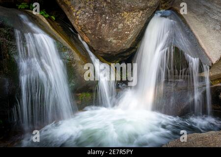 Waterfalls in granite rocks in Sierra de Gredos, Spain. Concept of nature and purity. Stock Photo