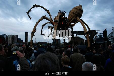A giant mechanical spider, part of a piece of 'free theatre' by French company La Machine entitled 'Les Mecaniques Servants', walks along the waterfront in Liverpool, September 5, 2008. The 37 tonne spider which stands at 50 feet (15 metres) tall is in Liverpool as part of the city's European capital of culture celebrations. REUTERS/Phil Noble (BRITAIN)