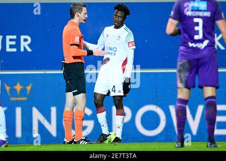 referee Bert Put and OHL's Kamal Sowah pictured during a soccer match between OH Leuven and Beerschot VA, Saturday 30 January 2021 in Oud-Heverlee, on Stock Photo