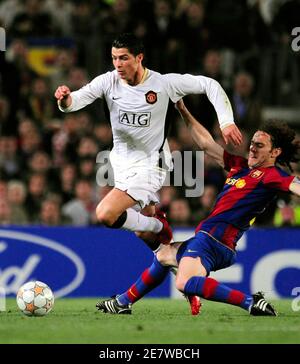 Barcelona's Gabriel Milito (R) challenges Manchester United's Cristiano  Ronaldo for the ball during their Champions League