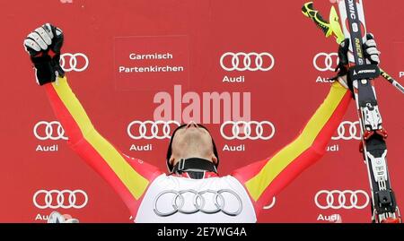 Germany's Felix Neureuther reacts at the podium after the men's Alpine Skiing World Cup Slalom in Garmisch-Partenkirchen March 13, 2010. REUTERS/Michaela Rehle (GERMANY SPORT SKIING)