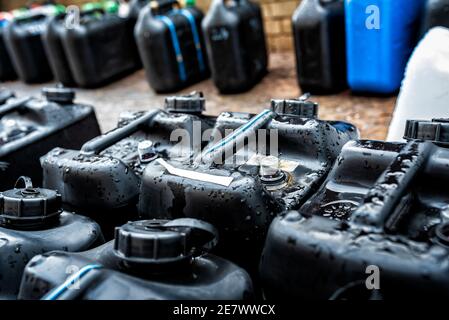 Plastic containers containing chemical waste from laboratories Stock Photo