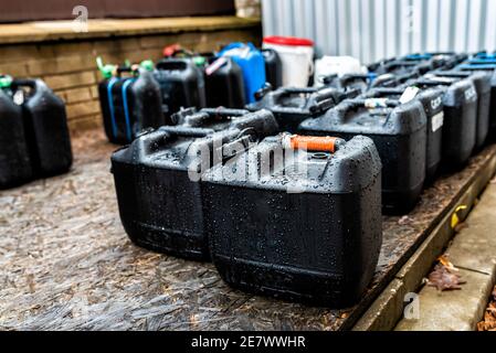 Plastic containers containing chemical waste from laboratories Stock Photo