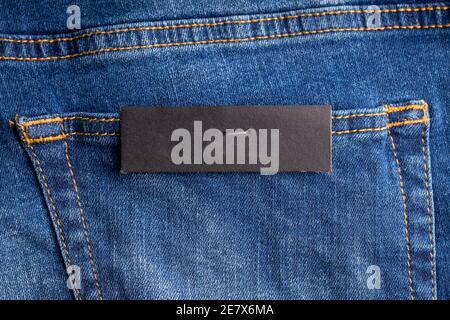 price tag on jean back pocket. empty mockup. background backdrop Stock Photo