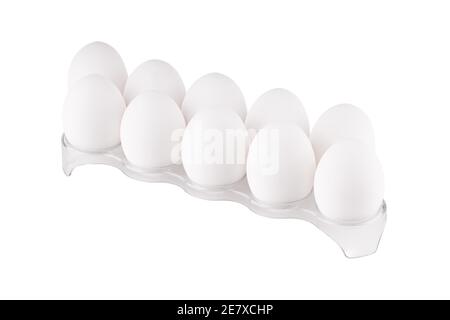 isolated on white stack of chicken eggs at plastic holder. Stock Photo