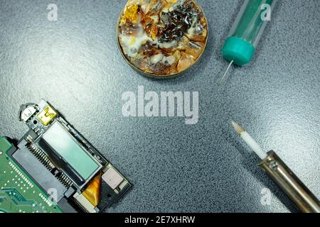 radio electronic parts repair with assembly tools. top view. electronics repair Stock Photo