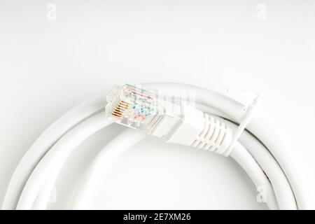 a white ethernet cable. internet technology and network concept. view from above Stock Photo
