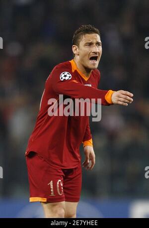 Rome, Italy. 27th Nov 2018. AS Roma former player Francesco Totti holds the  Hall of Fame jersey before the UEFA Champions League match between Roma and  Real Madrid at Stadio Olimpico, Rome