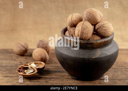 group of walnuts on a wooden background Stock Photo