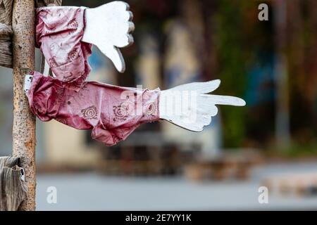 signs of pointers in different directions against a defocused street bsckground Stock Photo