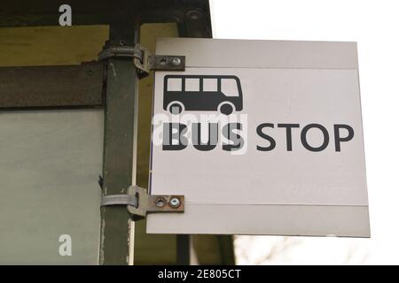 upward angle of bus stop sign Stock Photo