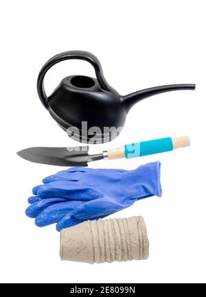Vertical shot of items needed when getting ready plant a garden.  Isolated on white. Stock Photo