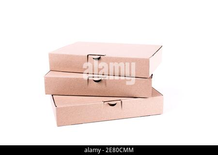 Closeup of Flat cardboard boxes isolated on white Stock Photo