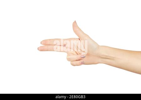 a female person showing gun or pistol gesture isolated on a white background. number three gesture Stock Photo
