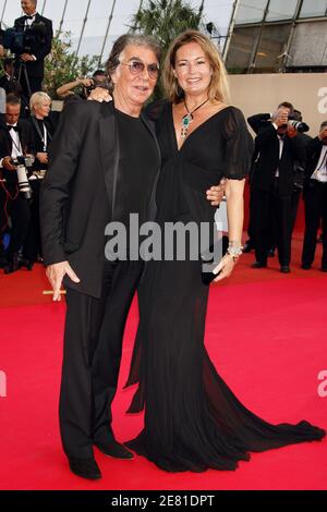 Roberto Cavalli and his wife Eva Duringer walk the red carpet of the Palais des Festivals in Cannes, France, May 22, 2007, for the gala screening of US director Julian Schnabel's film Le Scaphandre et le Papillon (The Diving Bell and the Butterfly), presented in competition at the 60th Cannes International Film Festival. The movie is about Elle France editor Jean-Dominique Bauby, who, in 1995 at the age of 43, suffered a stroke that paralyzed his entire body, except his left eye. Photo by Hahn-Nebinger-Orban/ABACAPRESS.COM Stock Photo