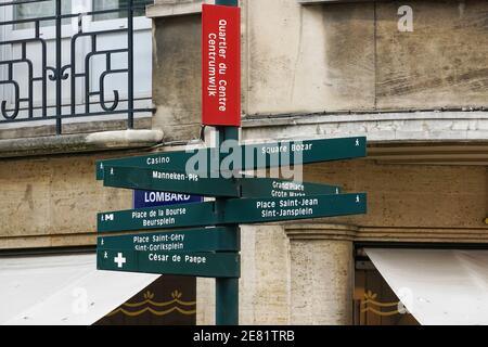 Signpost with directions showing tourist landmarks in Brussels, Belgium Stock Photo