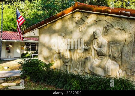 A stone relief Biblical sculpture on the Sunday School Building of Plymouth Congregational Church in Coconut Grove in Miami, Florida. Stock Photo