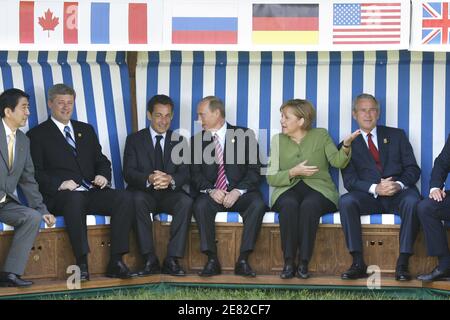 G8 Heads of State pose in a giant beach chair for a family picture in front of the Kurhaus building in Heiligendamm, northeastern Germany, during their first working session at Heiligendamm, Germany on June 7, 2007.(L-R) Japanese Prime Minister Shinzo Abe, Canadian Prime Minister Stephen Harper, French President Nicolas Sarkozy, Russian President Vladimir Putin, German Chancellor Angela Merkel, US President George W. Bush. Photo by Ludovic/pool/ABACAPRESS.COM Stock Photo