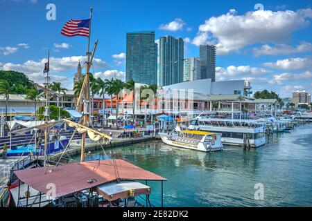 Tour boats docked at the marina located at The Bayfront Marketplace on Biscayne Bay in Miami, Florida. Stock Photo